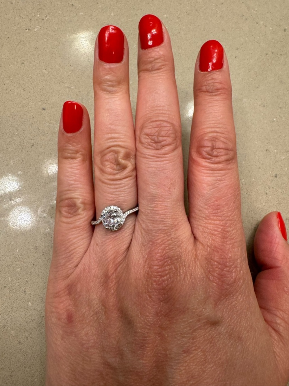 Halo Solitaire Engagement Ring in Silver with Clear Center Stone